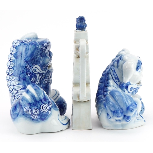 1532 - Chinese blue and white porcelain comprising two qilins and a teapot, the largest 25cm high