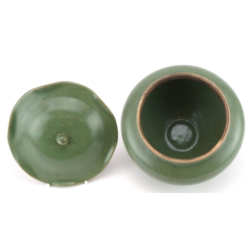 1529 - Korean porcelain jar and cover having a green glaze, 16cm high x 19cm in diameter