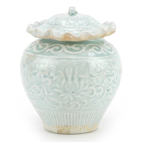 1466 - Chinese or Korean porcelain jar and cover having a celadon glaze decorated in low relief with flower... 