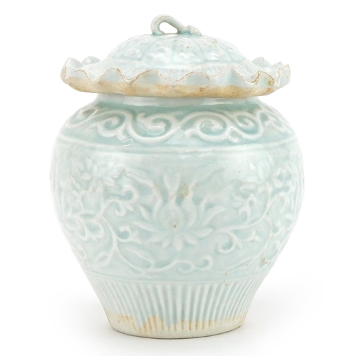 1466 - Chinese or Korean porcelain jar and cover having a celadon glaze decorated in low relief with flower... 