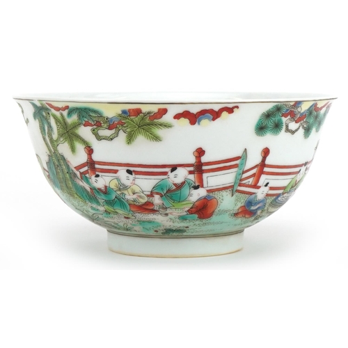 512 - Chinese porcelain bowl hand painted in the famille verte palette with children playing in a palace s... 