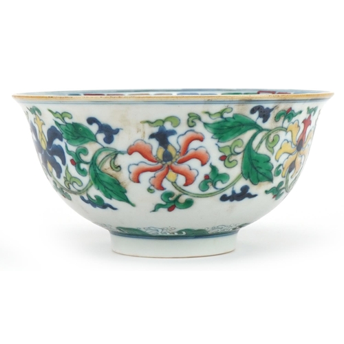 1390 - Chinese doucai porcelain bowl hand painted with flowers amongst foliage, six figure character marks ... 