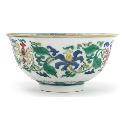 1390 - Chinese doucai porcelain bowl hand painted with flowers amongst foliage, six figure character marks ... 