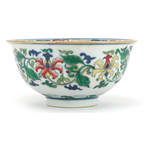 1390 - Chinese doucai porcelain bowl hand painted with flowers amongst foliage, six figure character marks ... 