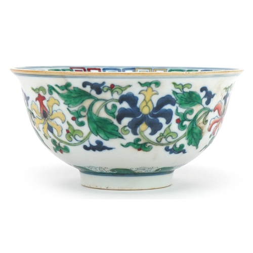 1390 - Chinese doucai porcelain bowl hand painted with flowers amongst foliage, six figure character marks ... 