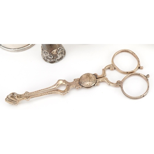 278 - Victorian and later silver including a pair of sugar tongs, caster and open salt, the largest 10.5cm... 