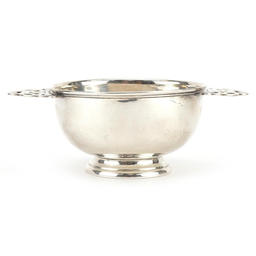 240 - Stokes & Ireland Ltd, Arts & Crafts silver quaich with twin handles, Chester 1919, 15cm wide, 132.6g