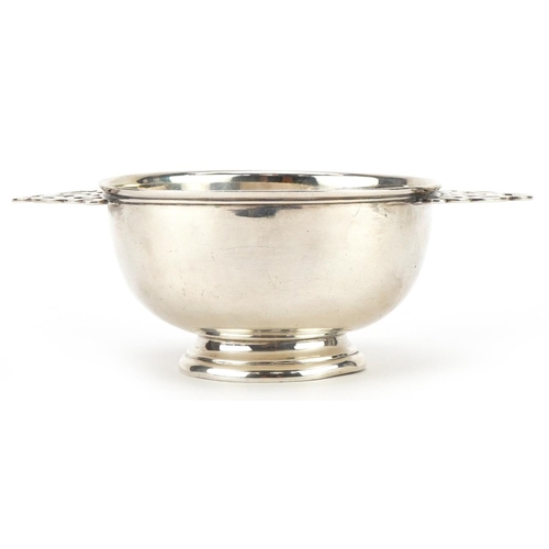 240 - Stokes & Ireland Ltd, Arts & Crafts silver quaich with twin handles, Chester 1919, 15cm wide, 132.6g