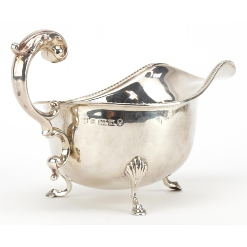 197 - S Blanckensee & Son Ltd, George V silver three footed sauceboat, Birmingham 1934, 17cm in length, 15... 