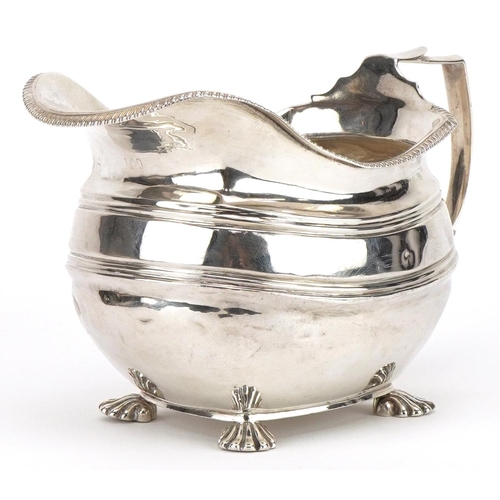 George III silver cream jug, indistinct hallmarks, possibly London 1809, 14.5cm in length, 178.4g