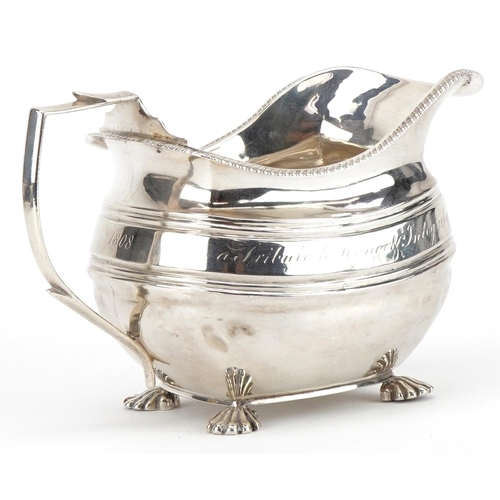 95 - George III silver cream jug, indistinct hallmarks, possibly London 1809, 14.5cm in length, 178.4g