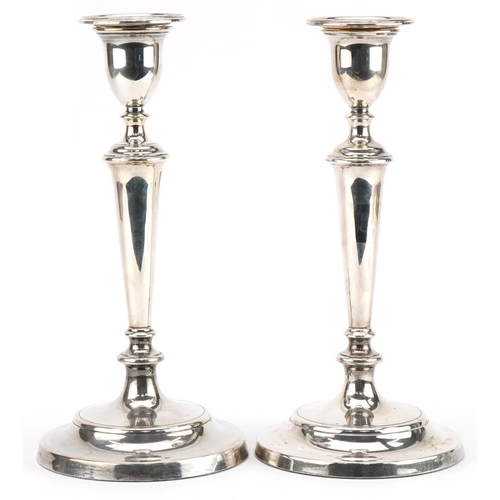 93 - M C Hersey & Son Ltd, pair of Elizabeth II silver candlesticks, London 1991, 26.5cm high, 1300.0g