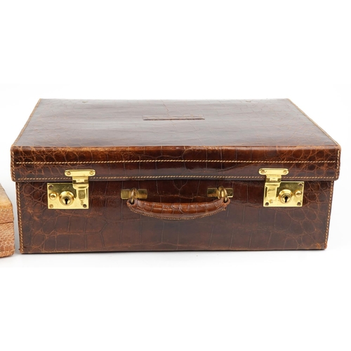 182 - Two early 20th century taxidermy interest cases comprising alligator skin vanity case retailed by Ha... 