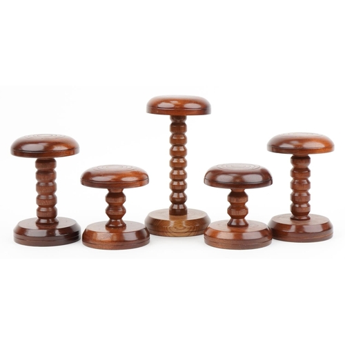 446 - Five Victorian style turned mahogany hatstands including two pairs, the largest 30cm high