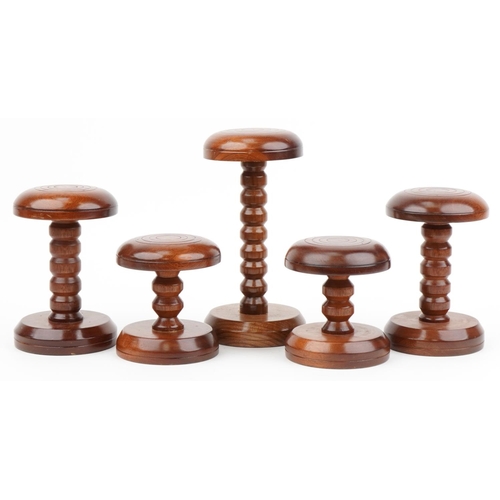 446 - Five Victorian style turned mahogany hatstands including two pairs, the largest 30cm high