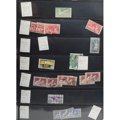 953 - World stamps arranged in seven albums including France, Germany and Hungary