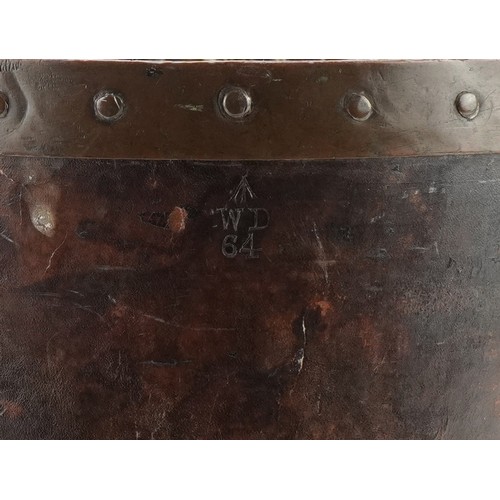 92 - 19th century military interest metal studded leather fire bucket impressed WD 64, 31cm high excludin... 