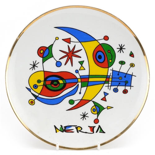 1770 - Saffron porcelain plate decorated with an abstract composition, signed Nerja, 19.5cm in diameter