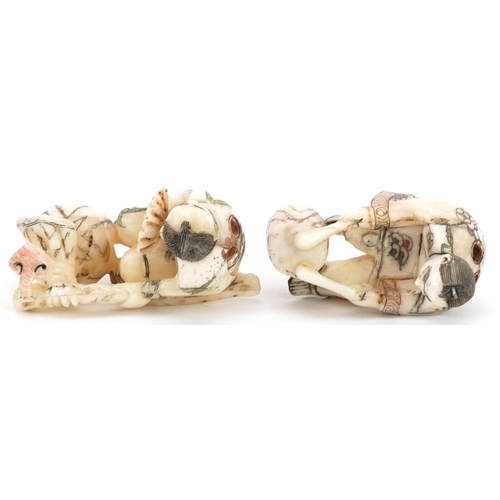 1766 - Two Japanese carved bone netsukes including a one of a drummer, the largest 5.5cm wide