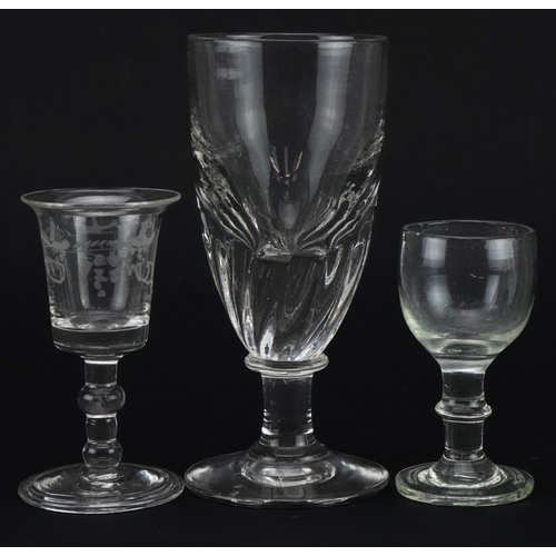 1774 - Three 18th century and later glasses including one with folded foot etched with berries, the largest... 