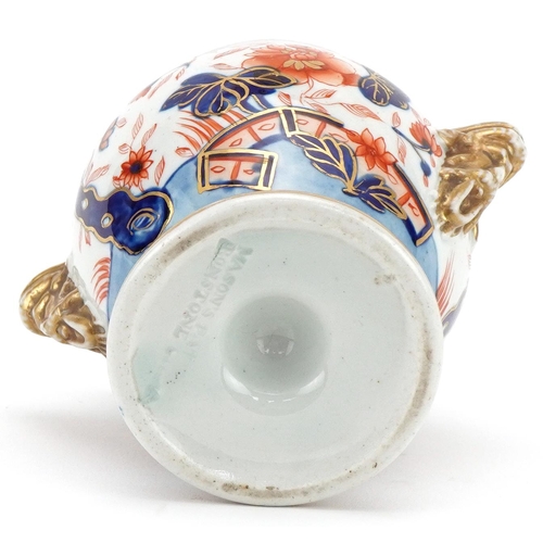 475 - Masons, 19th century ironstone pot pourri vase and cover with handles decorated in the Imari palette... 