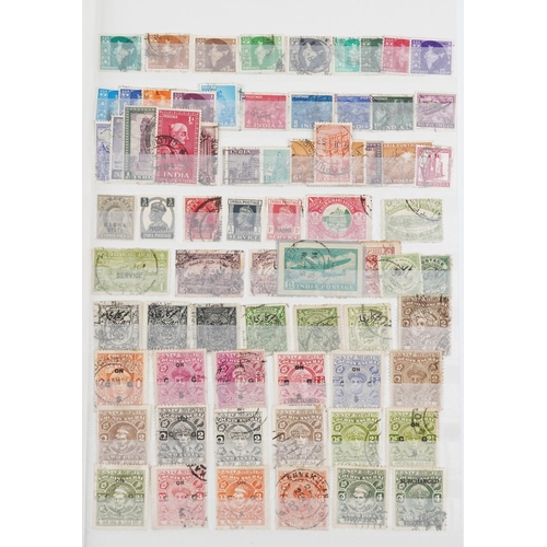 957 - 19th century and later British and commonwealth stamps arranged in a stock book including overprints