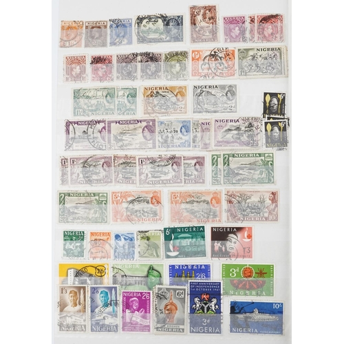 957 - 19th century and later British and commonwealth stamps arranged in a stock book including overprints