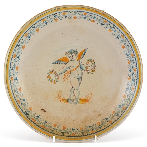 1523 - Italian Maiolica pottery plate hand painted with Putti holding two floral garlands, 28.5cm in diamet... 