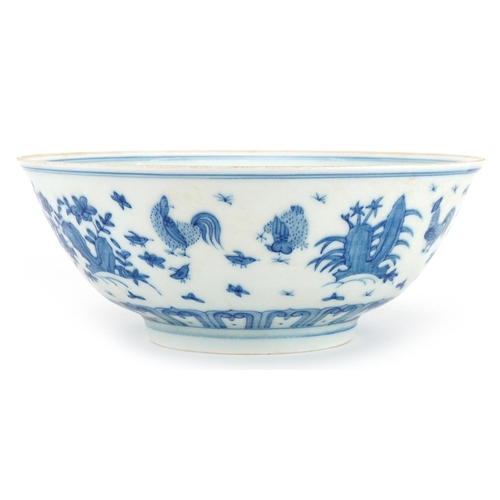 1328 - Chinese blue and white porcelain bowl hand painted with chickens in a landscape, six figure characte... 