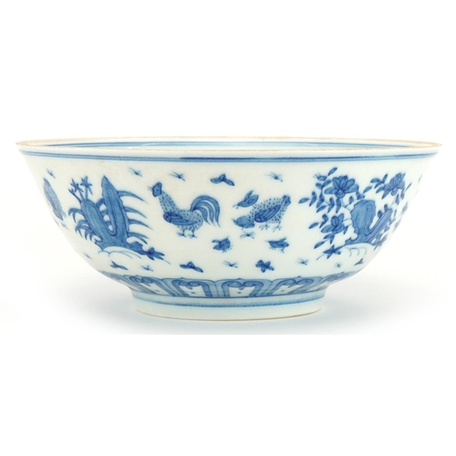 1328 - Chinese blue and white porcelain bowl hand painted with chickens in a landscape, six figure characte... 