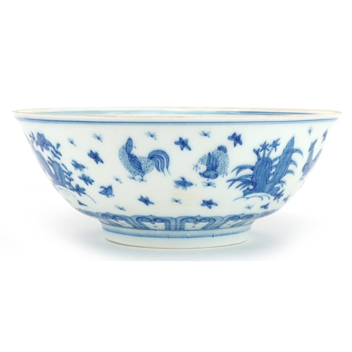 1328 - Chinese blue and white porcelain bowl hand painted with chickens in a landscape, six figure characte... 