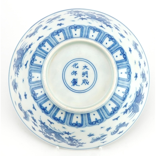 1328 - Chinese blue and white porcelain bowl hand painted with chickens in a landscape, six figure characte... 