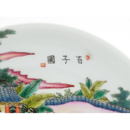 549 - Chinese porcelain shallow dish hand painted in the famille rose palette with children playing in a p... 