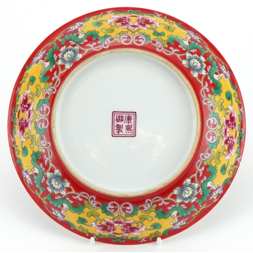 1424 - Chinese porcelain shallow dish hand painted in the famille rose palette and iron red with bats and f... 