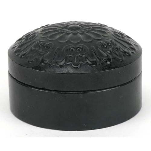 1447 - Islamic green jade box and cover carved with a flower head, 6cm in diameter