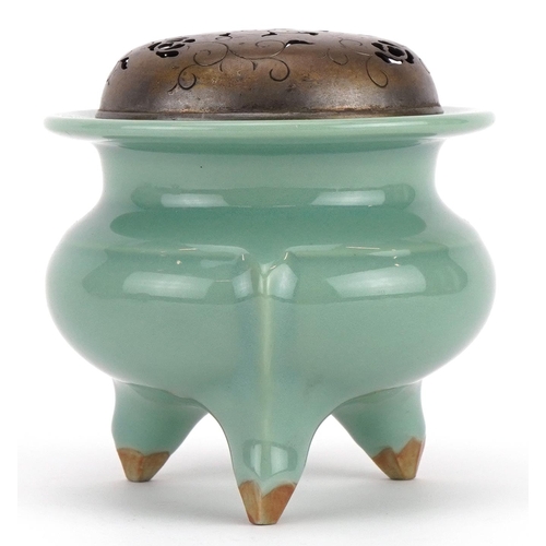 460 - Chinese porcelain tripod censer having a celadon glaze with pierced white metal lid, 9.5cm high