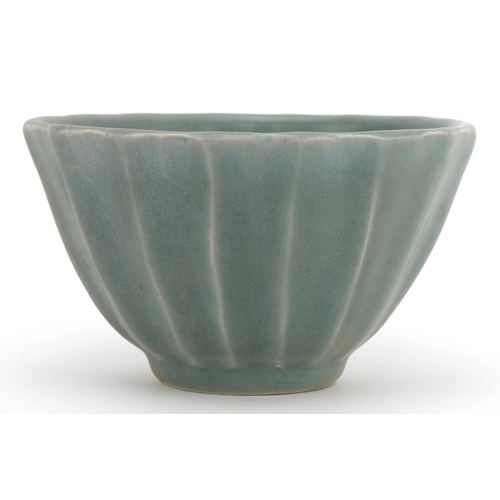 1526 - Chinese porcelain lotus bowl having a celadon glaze, 13.5cm in diameter