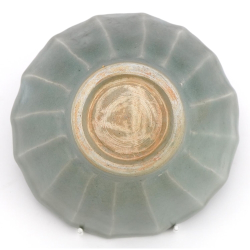 1526 - Chinese porcelain lotus bowl having a celadon glaze, 13.5cm in diameter