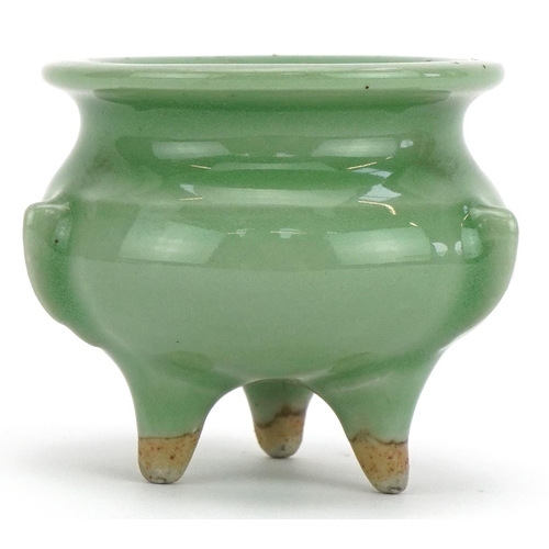 1445 - Miniature Chinese porcelain tripod censer having a celadon glaze, 5cm high