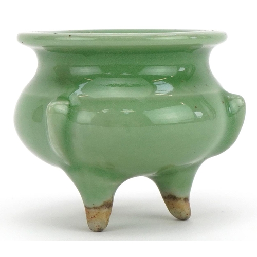 1445 - Miniature Chinese porcelain tripod censer having a celadon glaze, 5cm high