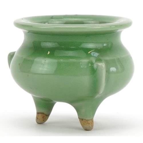 1445 - Miniature Chinese porcelain tripod censer having a celadon glaze, 5cm high