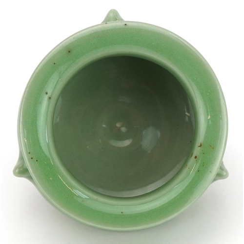 1445 - Miniature Chinese porcelain tripod censer having a celadon glaze, 5cm high