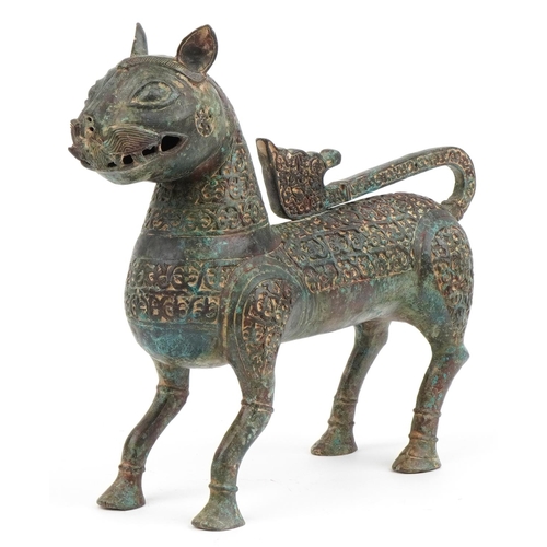 490 - Large Islamic verdigris patinated bronze mythical cat, 37cm in length