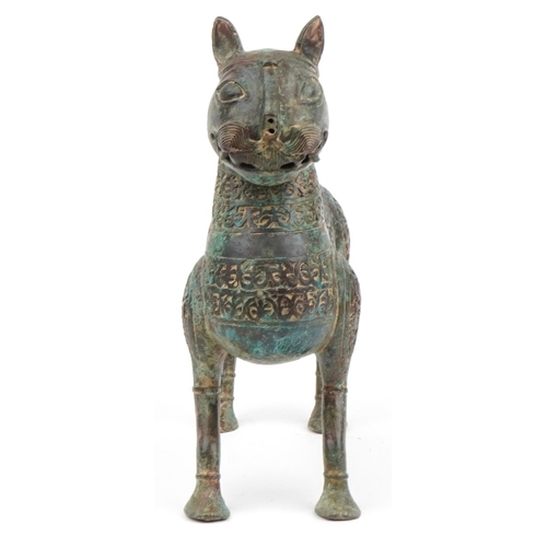 490 - Large Islamic verdigris patinated bronze mythical cat, 37cm in length