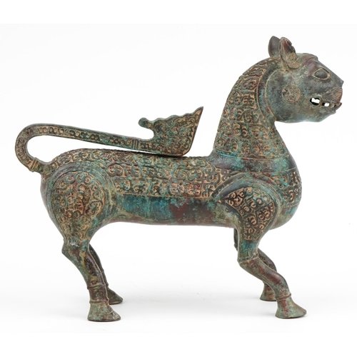 490 - Large Islamic verdigris patinated bronze mythical cat, 37cm in length