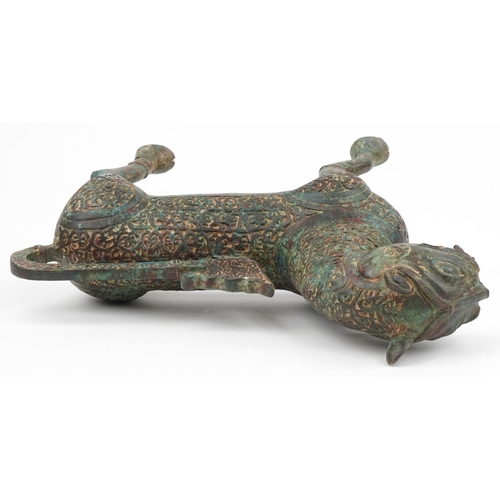 490 - Large Islamic verdigris patinated bronze mythical cat, 37cm in length