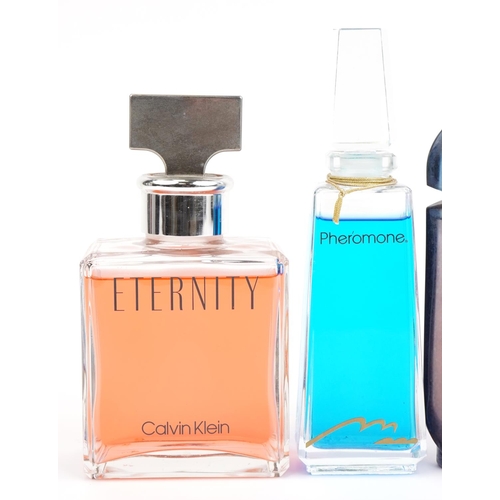 347 - Four shop dummy display scent bottles comprising Van Cleef & Arpels, Calvin Klein Eternity, Paco Rab... 