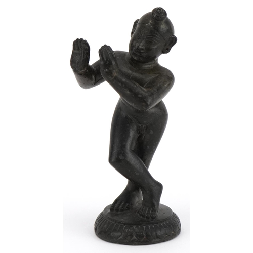 493 - Indian black stone carving of Krishna, 18cm high