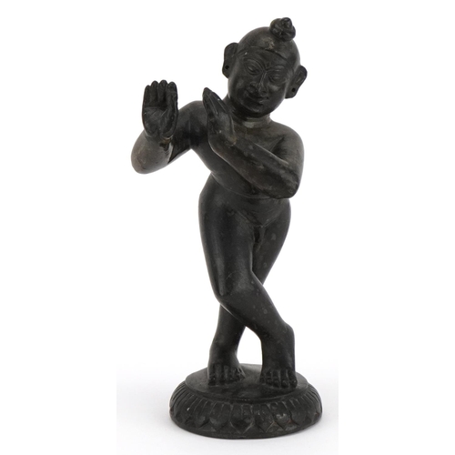 493 - Indian black stone carving of Krishna, 18cm high