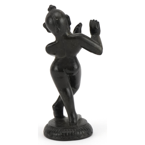 493 - Indian black stone carving of Krishna, 18cm high